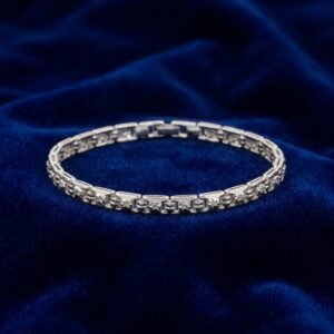 Elegant Sterling Silver Tennis Bracelet with Interlocking Geometric Links and Diamond-Cut Accents